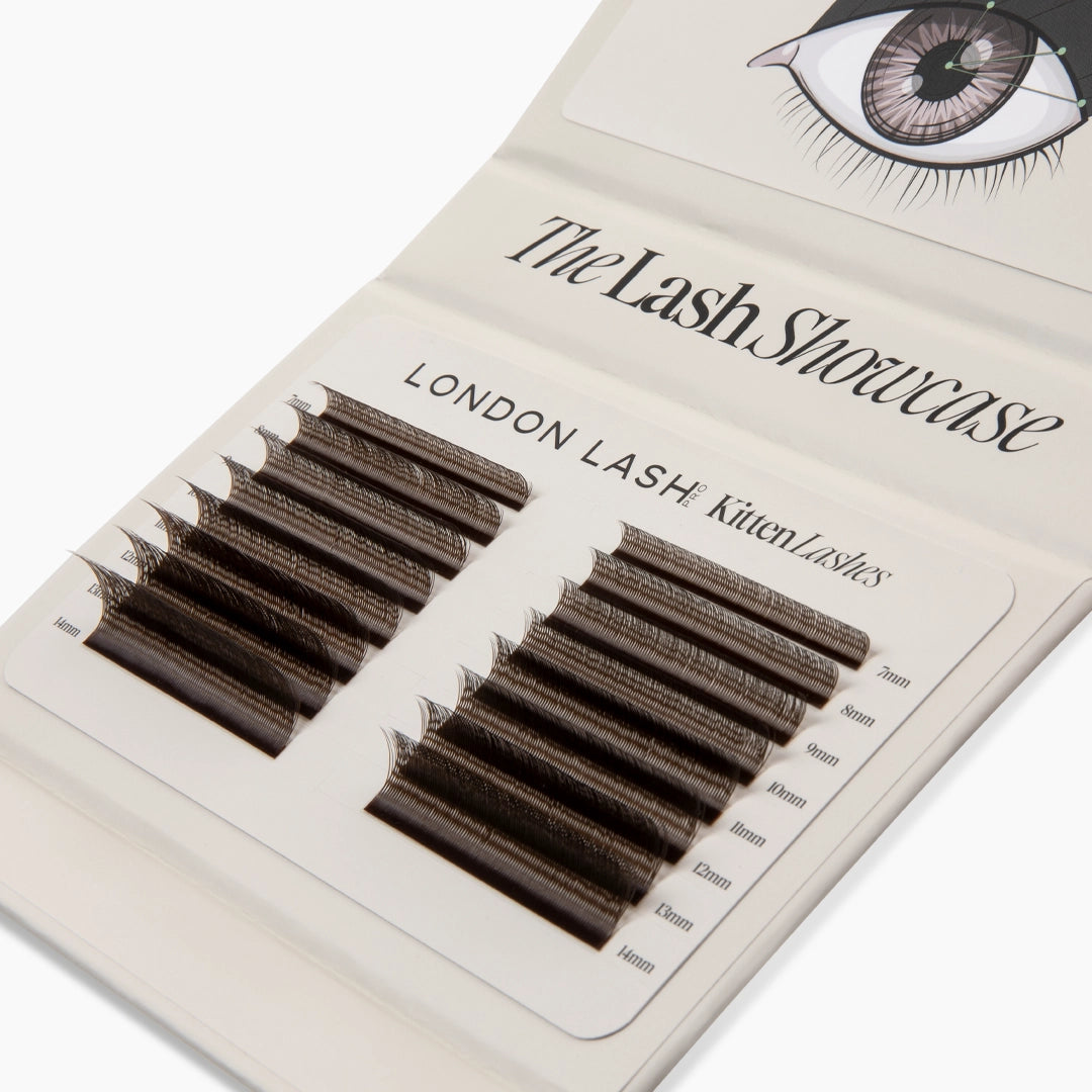 Angled view of an open lash palette with organised rows of brown Kitten Lash extension strips from 7mm to 14mm.